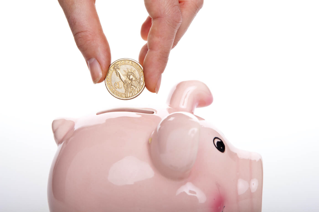 Saving money piggy bank coin hand home inspections jacksonville fl